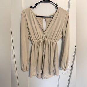 Such a cute, suede romper. Fits very flattering.